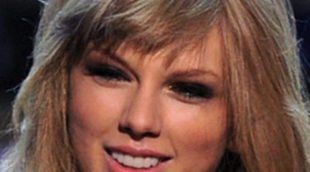 Taylor Swift intenta poner buena cara a los fotógrafos tras su ruptura con Harry Styles