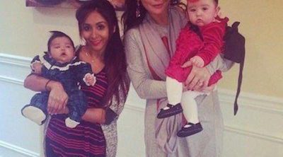 Snooki y Jwoww felicitan la Navidad 2014 con sus hijas Giovanna y Meilani en brazos