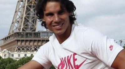 Rafa Nadal celebra con Xisca Perelló en París su triunfo histórico en Roland Garros 2012