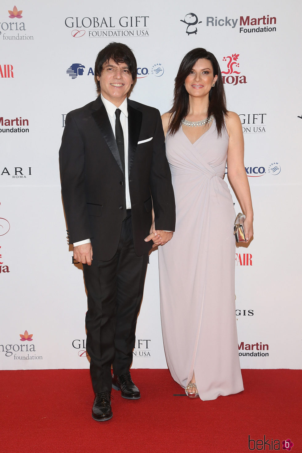 Laura Pausini y Paolo Carta en la gala Global Gift de México