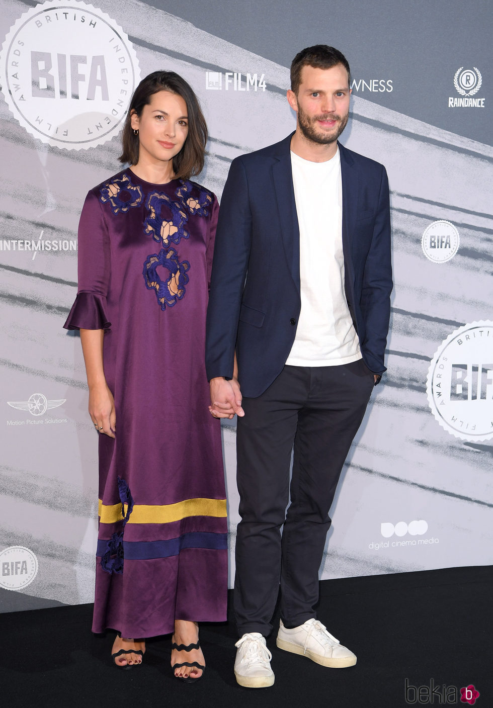 Jamie Dornan y Amelia Warner posando en los Premios del Cine Independiente Británico 2016