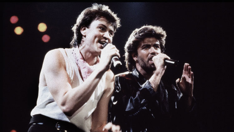 George Michael cantando en un concierto en 1985