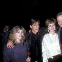 Lisa, Eric y Julia Roberts con John Voight en un evento