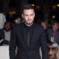 Liam Payne posando en la alfombra roja de 'I Am Bolt'