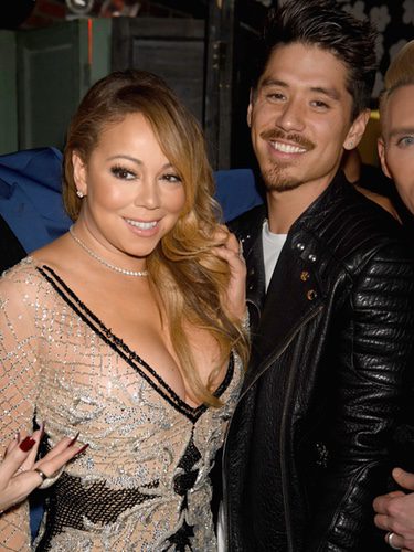 Mariah Carey y Bryan Tanaka en una fiesta