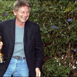 Roman Polanski con el premio Oscar