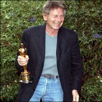 Roman Polanski con el premio Oscar