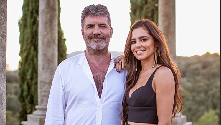 Cheryl Cole junto a Simon Cowell