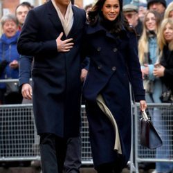 El Príncipe Harry de Inglaterra y Meghan Markle en su primer acto público oficial