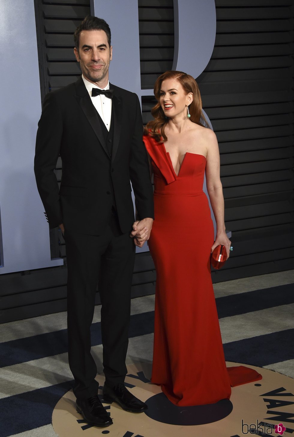 Isla Fisher y Sacha Baron Cohen en la fiesta Vanity Fair tras los Oscar 2018