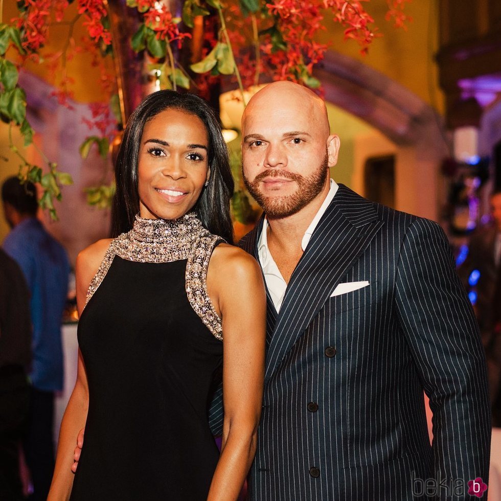 Michelle Williams y Chad Johnson en una fiesta