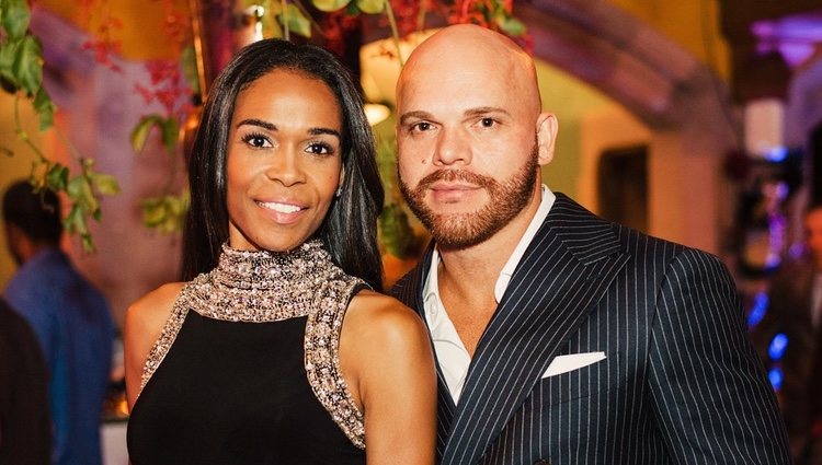 Michelle Williams y Chad Johnson en una fiesta