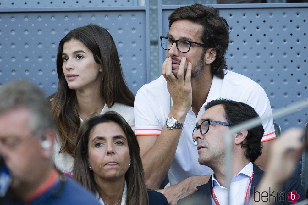 Feliciano López y Sandra Gago viendo un partido del Madrid Open 2018