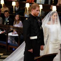 El Príncipe Harry y Meghan Markle al comienzo de su boda