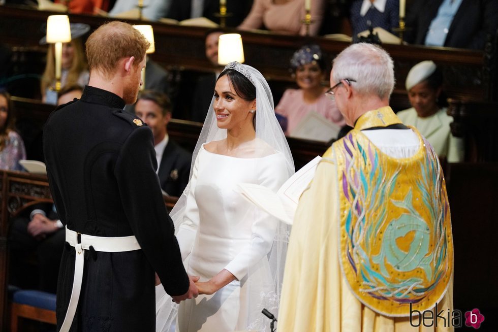 El Príncipe Harry y Meghan Markle durante los votos matrimoniales