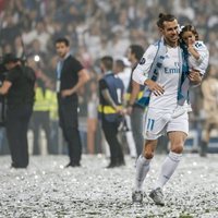 Gareth Bale con su hija Nava Valentina celebrando en el Santiago Bernabéu la Champions 2018