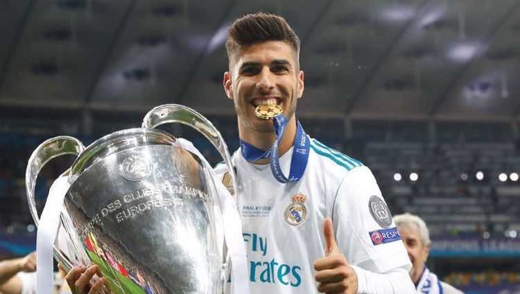 Marco Asensio celebrando la Champions 2018 en Kiev