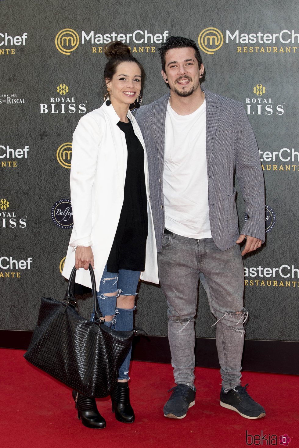 Carlos Maldonado y su pareja en la inauguración del restaurante de 'MasterChef' en Madrid