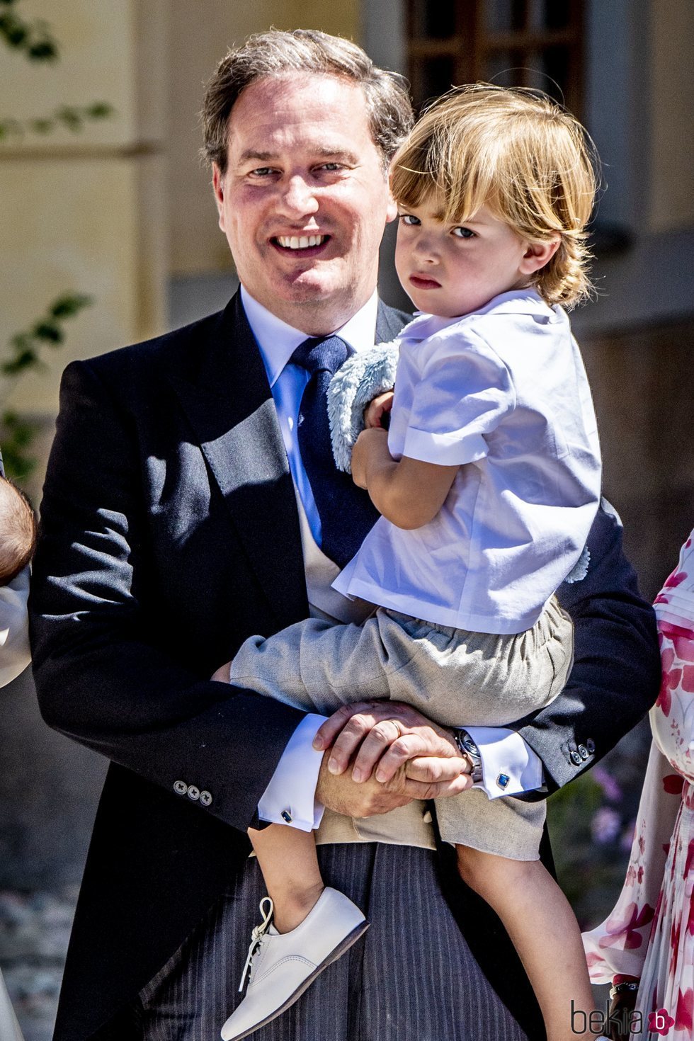 Chris O'Neill y Nicolás de Suecia en el bautizo de Adrienne de Suecia