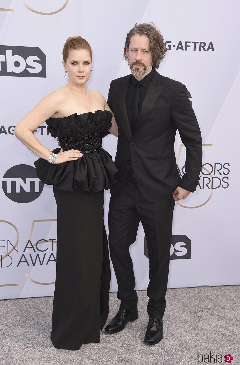 Amy Adams y Darren Le Gallo en el photocall de los SAG 2019