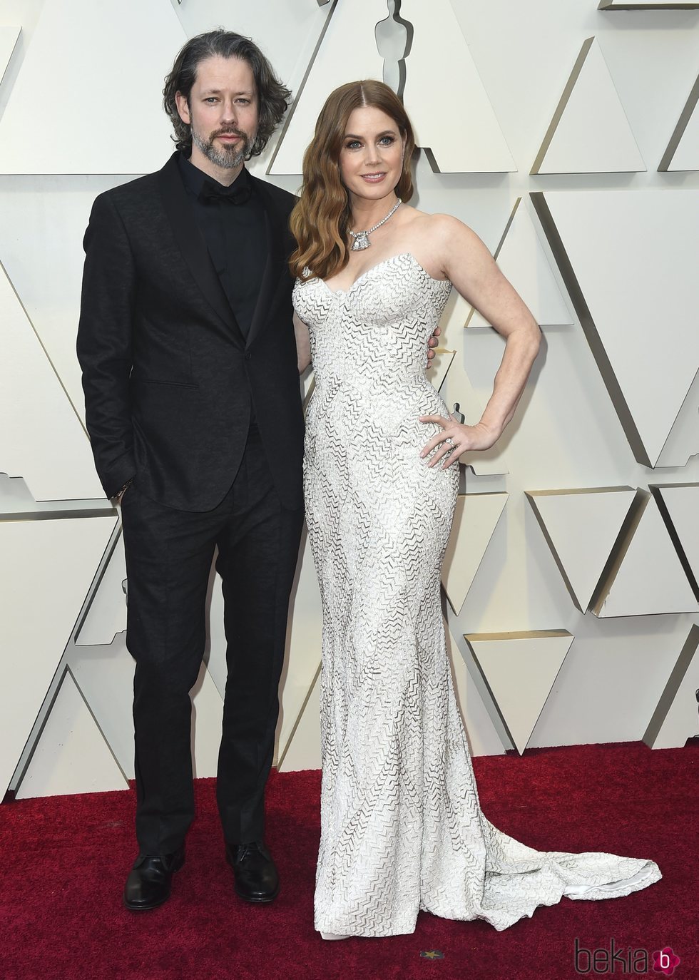 Amy Adams y Darren Le Gallo en la alfombra roja de los Premios Oscar 2019