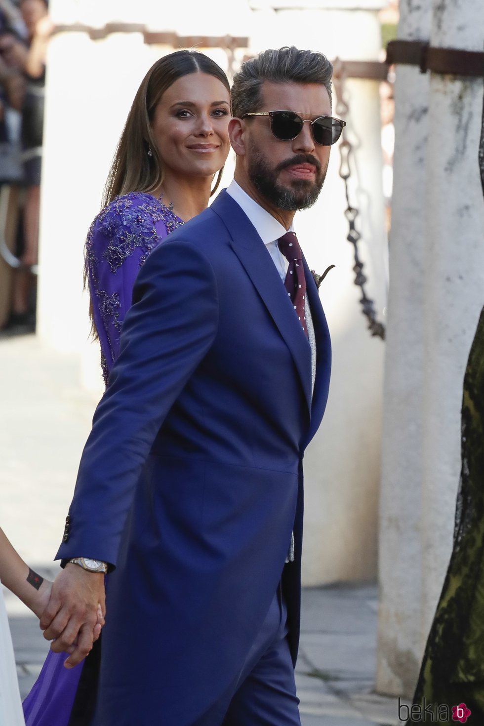 Lorena Gómez y René Ramos a la salida de la boda de Sergio Ramos y Pilar Rubio