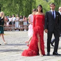 Marta Lozano y su pareja en la boda de María Pombo y Pablo Castellanos