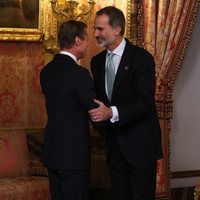 El Rey Felipe saluda a Enrique de Luxemburgo en la recepción por la Conferencia sobre el Cambio Climático