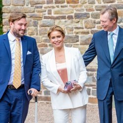 Enrique y María de Teresa de Luxemburgo y su hijo Sebastián de Luxemburgo en el bautizo de Carlos de Luxemburgo