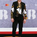 Tom Daley en la alfombra roja de los Brit Awards 2022