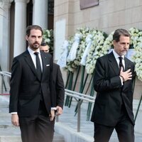 Pablo de Grecia, Nicolás de Grecia y Philippos de Grecia en el funeral de Constantino de Grecia