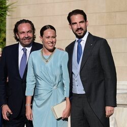 El Príncipe Philippos de Grecia y Nina Flohr junto al padre de ella, Thomas Flohr, en la boda de Theodora de Grecia