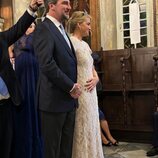 Nicolás de Grecia y Chrysi Vardinoyannis con la mano en el vientre durante su boda