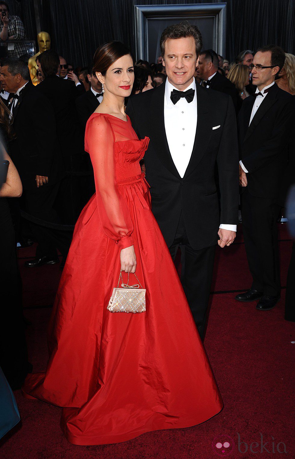 Colin Firth y Livia Giuggioli en la alfombra roja de los Oscar 2012