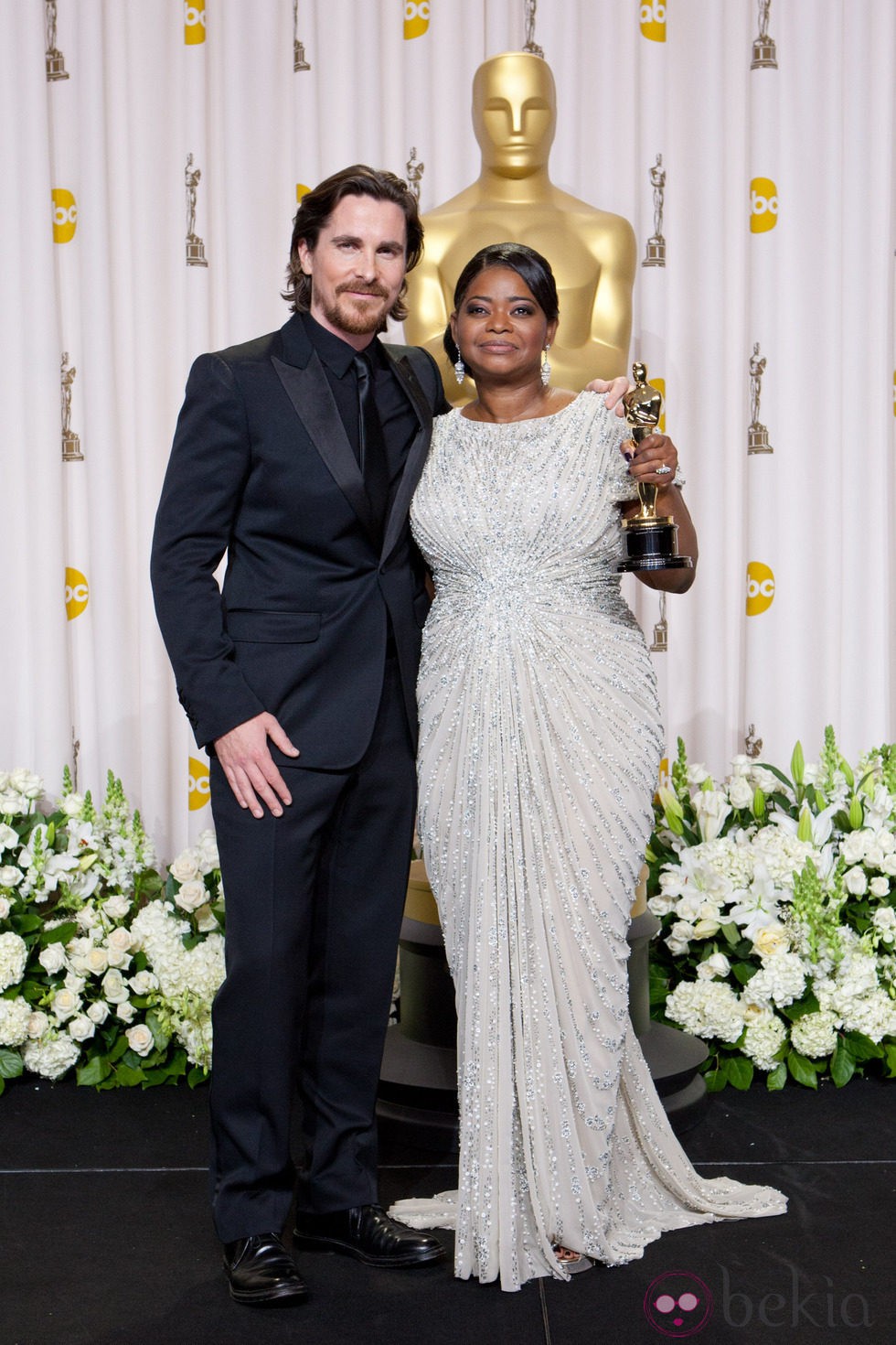 Christian Bale y Octavia Spencer en los Oscars 2012