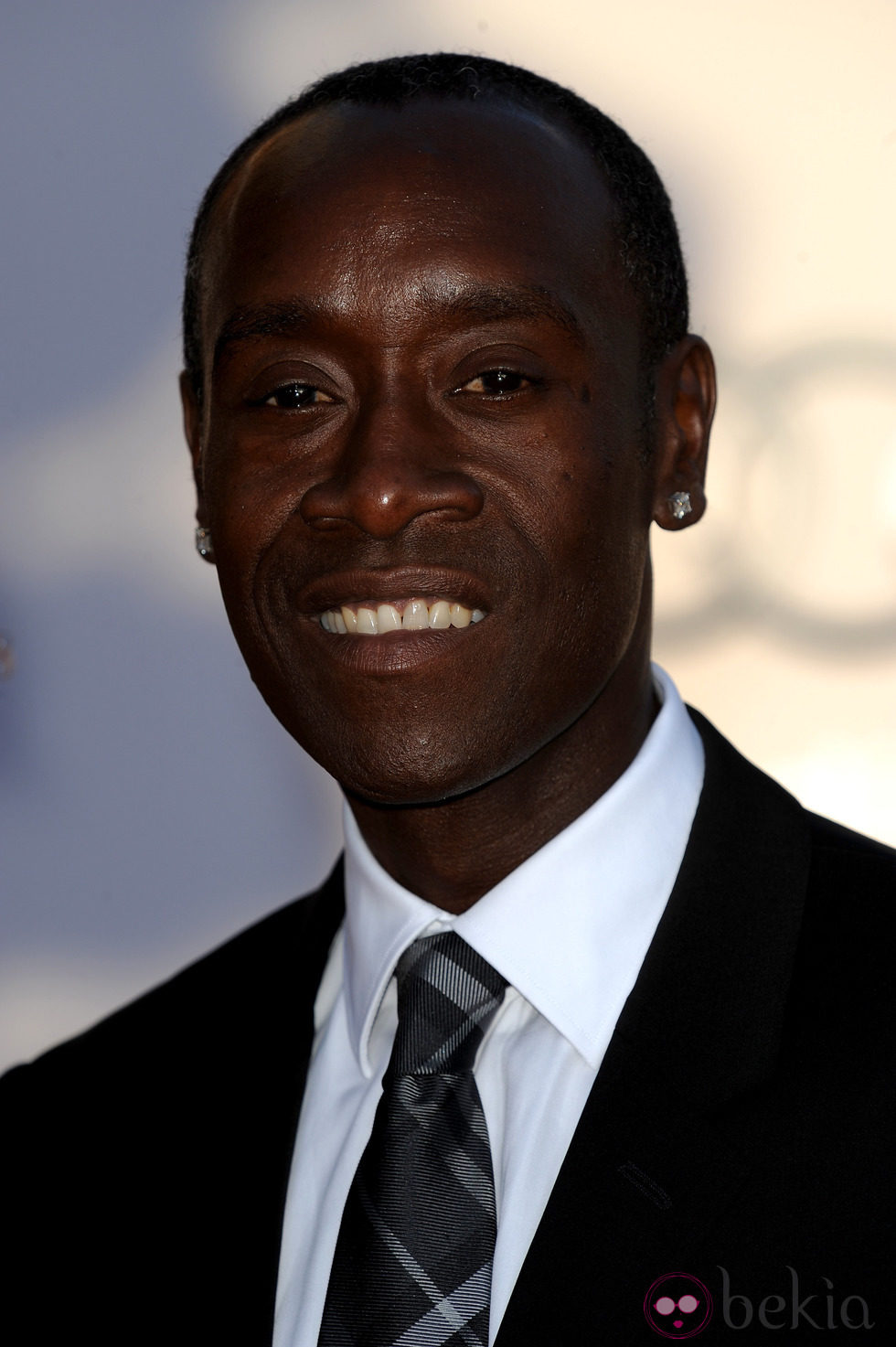 Don Cheadle posa en el photocall de los BAFTA Brits