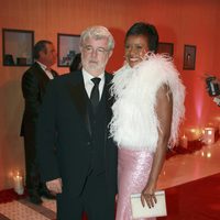 George Lucas y Melanie Hobbson en la gala posterior al Gran Premio de F1 de Mónaco