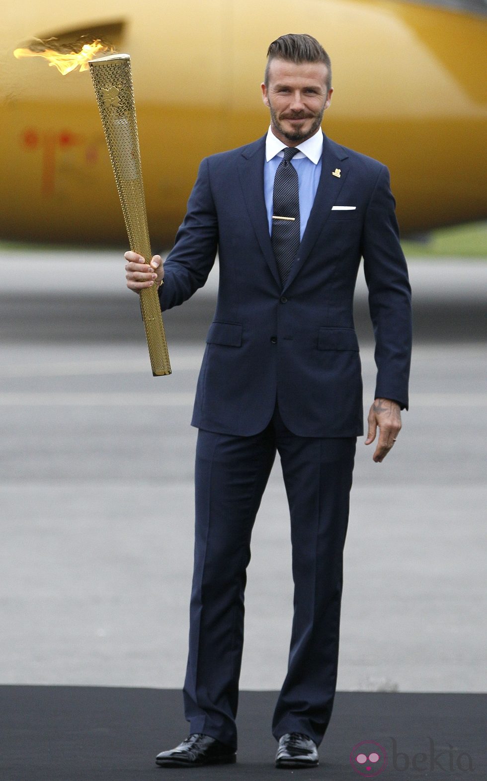 David Beckham con la antorcha olímpica