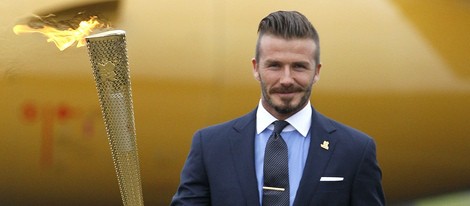 David Beckham con la antorcha olímpica