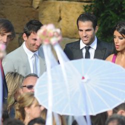 Leo Messi, Cesc Fábregas y Daniella Semaan en la boda de Andrés Iniesta y Anna Ortiz