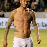 David Beckham luce sus tatuajes