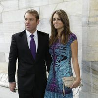 Liz Hurley y Shane Warne en el desfile de Cavalli en la Semana de la Moda de Milán