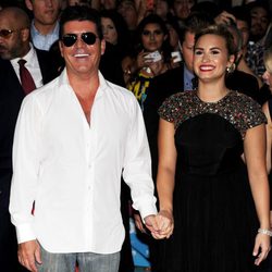 Simon Cowell y Demi Lovato en la première de 'The X Factor'