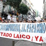 Pancarta pidiendo un Estado Laico en la manifestación laica