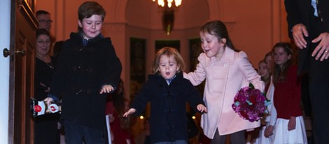 Christian, Vicente e Isabel de Dinamarca en un concierto de Navidad