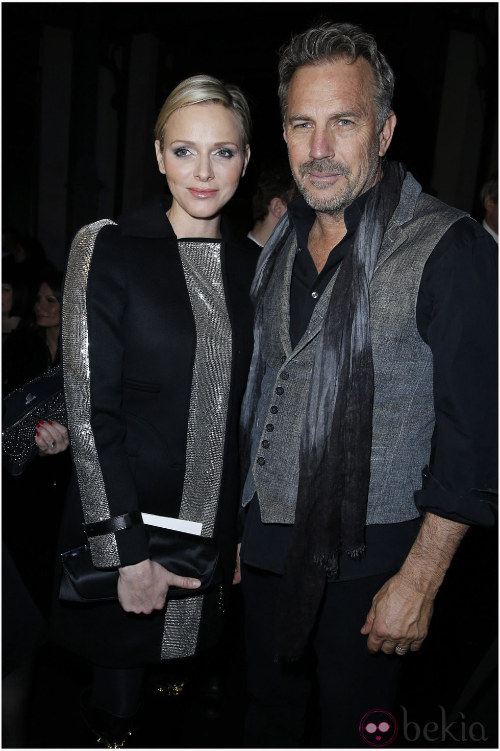 Charlene de Mónaco y Kevin Costner en la Semana de la Moda de París otoño/invierno 2013/2014