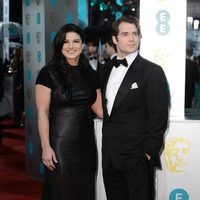 Gina Carano y Henry Cavill en la alfombra roja de los BAFTA 2013