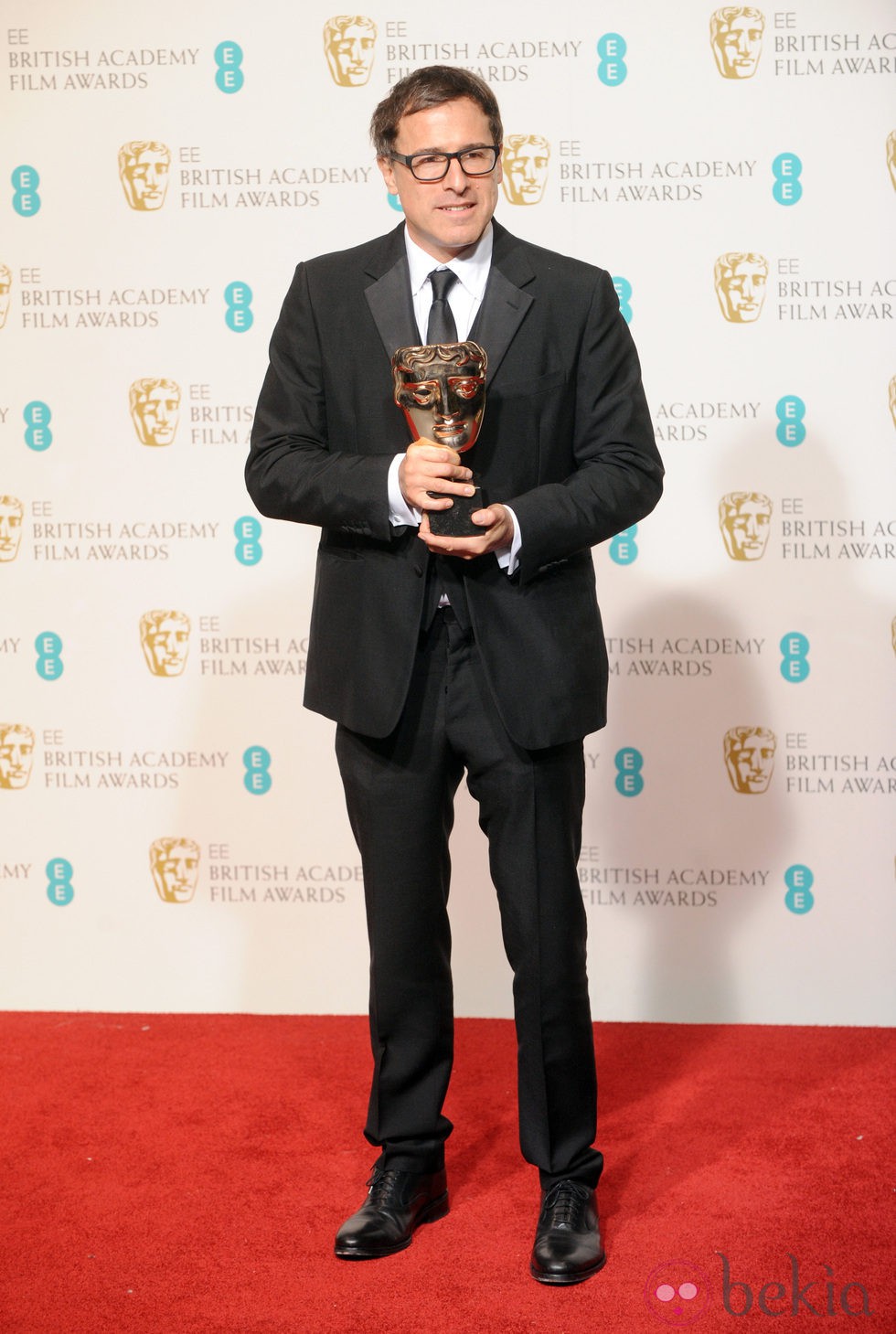 David O. Russell con el BAFTA 2013 de 'El lado bueno de las cosas'