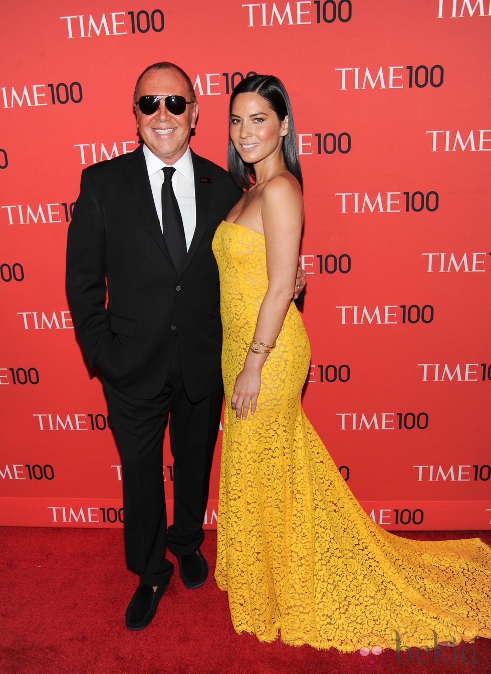 Olivia Munn y el diseñador Michael Kors en la gala de la revista Time 2013