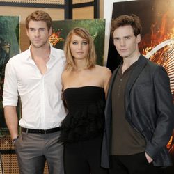 Liam Hemsworth, jennifer Lawrence y Sam Claflin en la presentación de 'Los Juegos del Hambre: En llamas' en Cannes 2013